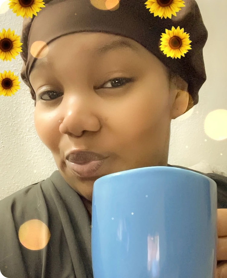Krisi relaxing at home with a mug of coffee