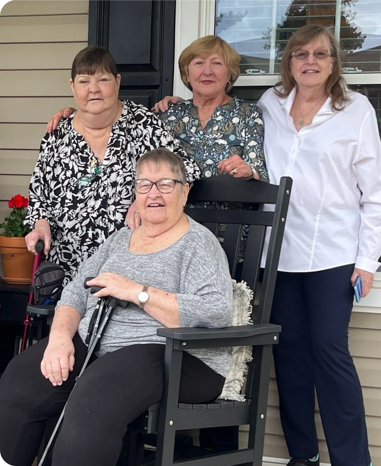 Pat and her family gathered on the front porch
